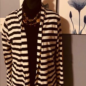 Angvns Jacket
White with Black Horizontal strips . Brown suede elbow . Size XL.